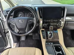 2021 Toyota Alphard Hybrid 2.5L Premium, белый — фото 32