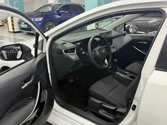 2023 Toyota Corolla 1.8L Hybrid Elite, белый — фото 4