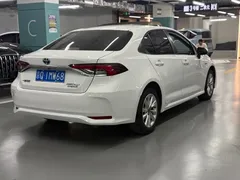 2023 Toyota Corolla 1.8L Hybrid Elite, белый — фото 13
