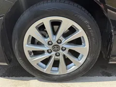 2021 Toyota Camry Hybrid 2.5HGVP Leading, чёрный — фото 17