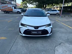 2021 Toyota Corolla 1.2T S-CVT Elite Plus, белый — фото 2