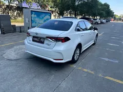 2021 Toyota Corolla 1.2T S-CVT Elite Plus, белый — фото 7