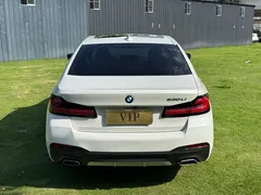 2022 BMW 5 Series 530Li M Sport Package, белый — фото 5