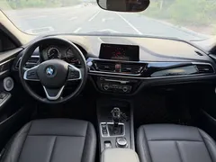 2021 BMW 1 Series 120i M Sport, синий — фото 11
