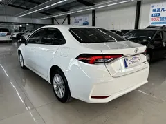 2021 Toyota Corolla 1.2T S-CVT Elite, белый — фото 4