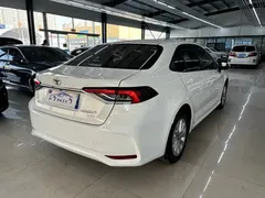 2021 Toyota Corolla 1.2T S-CVT Elite, белый — фото 5