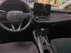 2023 Toyota Corolla 1.8L Hybrid Pioneer, белый — фото 12