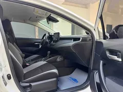 2023 Toyota Corolla 1.2T Pioneer, белый — фото 10