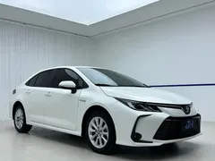 2021 Toyota Corolla Hybrid 1.8L E-CVT Elite, белый — фото 3