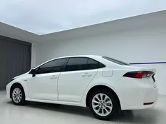 2021 Toyota Corolla Hybrid 1.8L E-CVT Elite, белый — фото 4