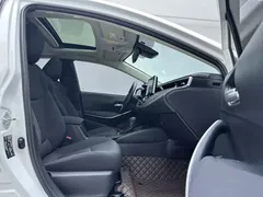 2021 Toyota Corolla Hybrid 1.8L E-CVT Elite, белый — фото 8