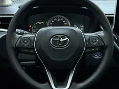 2021 Toyota Corolla Hybrid 1.8L E-CVT Elite, белый — фото 12