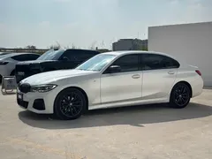 2021 BMW 3 Series 325Li M Sport Night Package, белый — фото 1