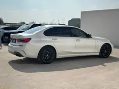 2021 BMW 3 Series 325Li M Sport Night Package, белый — фото 16