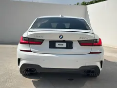 2021 BMW 3 Series 325Li M Sport Night Package, белый — фото 17