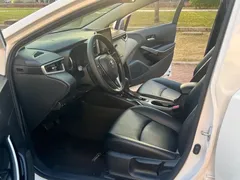 2021 Toyota Corolla Hybrid 1.8L E-CVT Elite, белый — фото 4