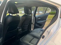 2021 Toyota Corolla Hybrid 1.8L E-CVT Elite, белый — фото 6