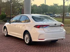 2021 Toyota Corolla Hybrid 1.8L E-CVT Elite, белый — фото 7