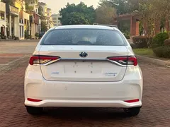 2021 Toyota Corolla Hybrid 1.8L E-CVT Elite, белый — фото 8