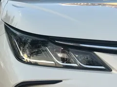 2021 Toyota Corolla Hybrid 1.8L E-CVT Elite, белый — фото 10