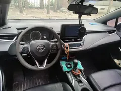 2022 Toyota Levin Hybrid 1.8H E-CVT Leading, белый — фото 12