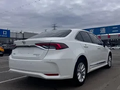2021 Toyota Corolla 1.2T S-CVT Elite Plus, белый — фото 6