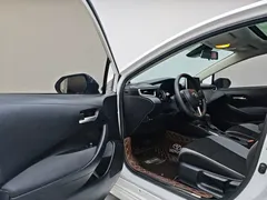 2021 Toyota Corolla 1.2T S-CVT Elite Plus, белый — фото 10
