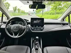2023 Toyota Corolla 1.8L Hybrid Elite, белый — фото 7