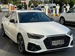 2023 Audi A4L 40 TFSI Luxury Dynamic, белый — фото 3