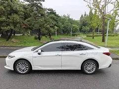 2022 Toyota Avalon Hybrid 2.5L XLE Premium, белый — фото 4