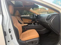 2022 Lexus NX 400h+ PHEV, белый — фото 10