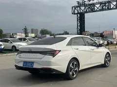 2022 Hyundai Elantra 240TGDi DCT LUX Premium, белый — фото 10