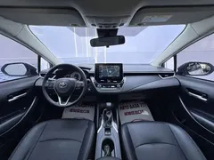 2021 Toyota Corolla 1.2T S-CVT Elite, белый — фото 15