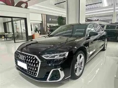 2023 Audi A8L 50 TFSI quattro Select, чёрный — фото 1