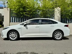 2021 Toyota Corolla Hybrid 1.8L E-CVT Pioneer, белый — фото 4