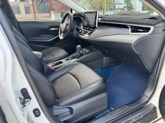 2021 Toyota Corolla Hybrid 1.8L E-CVT Pioneer, белый — фото 7