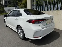 2021 Toyota Corolla Hybrid 1.8L E-CVT Pioneer, белый — фото 14
