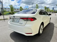 2021 Toyota Corolla Hybrid 1.8L E-CVT Pioneer, белый — фото 15