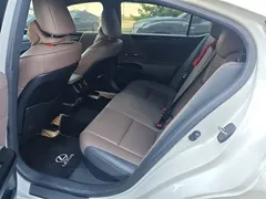 2022 Lexus ES 300h Excellence, белый — фото 5