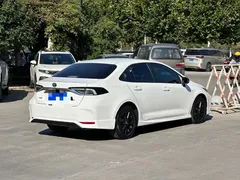 2021 Toyota Corolla TNGA 1.5L CVT GR Sport, белый — фото 4