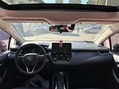 2021 Toyota Corolla TNGA 1.5L CVT GR Sport, белый — фото 8