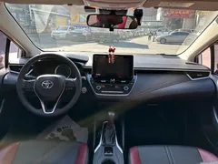 2021 Toyota Corolla TNGA 1.5L CVT GR Sport, белый — фото 9