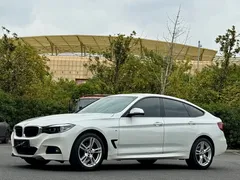 2020 BMW 3 Series GT 320i M Sport Package, белый — фото 1