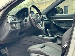 2020 BMW 3 Series GT 320i M Sport Package, белый — фото 4