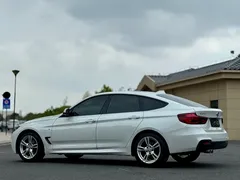 2020 BMW 3 Series GT 320i M Sport Package, белый — фото 9