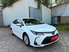 2022 Toyota Corolla 1.8L Hybrid E-CVT, белый — фото 1
