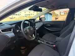 2022 Toyota Corolla 1.8L Hybrid E-CVT, белый — фото 5