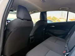 2022 Toyota Corolla 1.8L Hybrid E-CVT, белый — фото 6