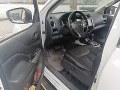 2023 Nissan Navara 2.5L AT 4WD Premium, белый — фото 16