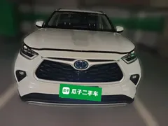 2022 Toyota Highlander Hybrid 2.5L 4WD Premium 7-seat, белый — фото 2